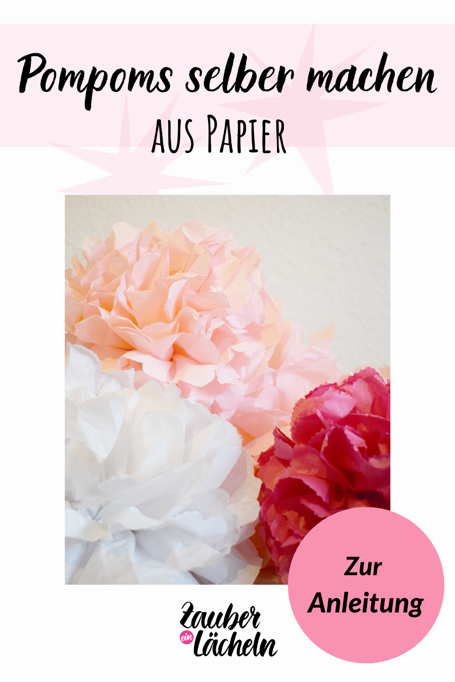 Pinterest Pin rosa, weiße und pinke selbstgemachte Pompoms aus Papier hängend vor weißer Wand